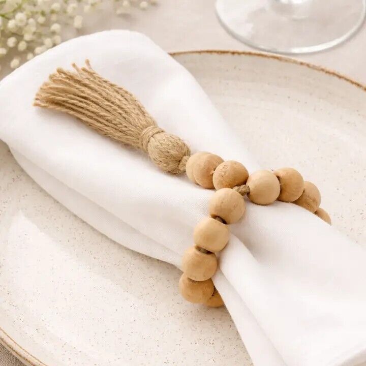 Argola para guardanapo com conta de madeira natural e borla C/4 UND